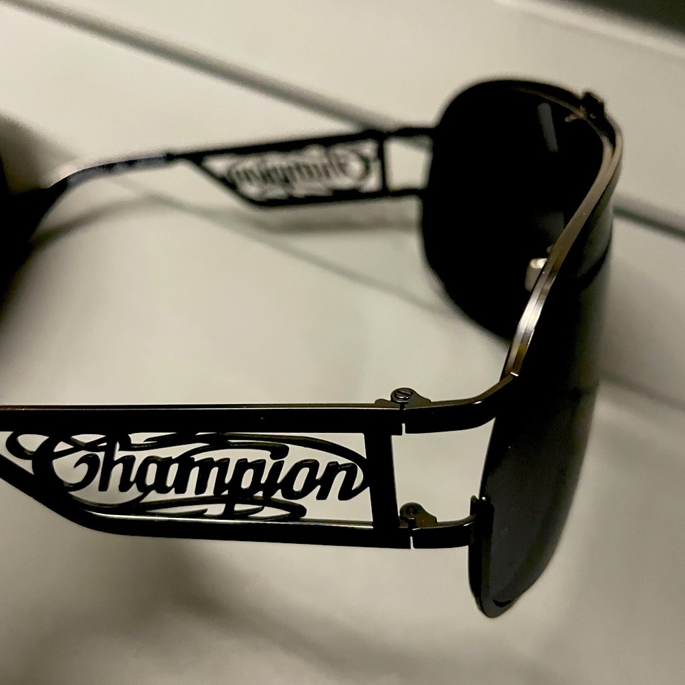 Champion Black Frame Sunglasses
Brand New with case no scratches